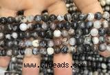 CAA3591 15.5 inches 4mm round black zebra agate beads wholesale