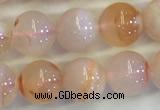 CAA3643 15.5 inches 6mm round sakura agate beads wholesale