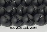 CAA3655 15.5 inches 6mm round matte & carved black agate beads