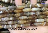 CAA5110 15.5 inches 8*16mm rice striped agate beads wholesale