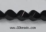 CAB336 15.5 inches 10*14mm faceted & twisted rice black agate beads