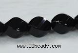 CAB337 15.5 inches 15*20mm faceted & twisted rice black agate beads