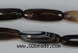 CAG1345 15.5 inches 10*30mm faceted rice line agate gemstone beads