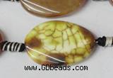 CAG1578 15.5 inches 20*30mm twisted oval fire crackle agate beads