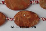 CAG1590 15.5 inches 20*30mm twisted oval fire crackle agate beads