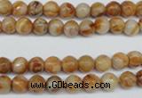 CAG1885 15.5 inches 6mm faceted round lemon crazy lace agate beads