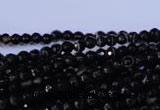 CAG2312 15.5 inches 4mm faceted round black line agate beads