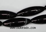 CAG2969 15.5 inches 10*30mm rice black line agate beads