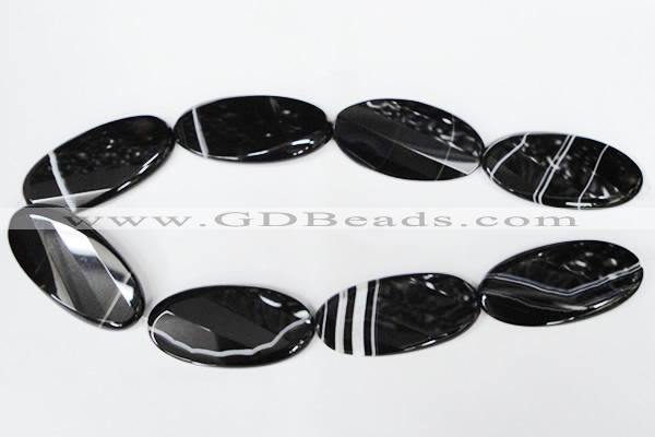 CAG3086 15.5 inches 25*50mm faceted oval black line agate beads