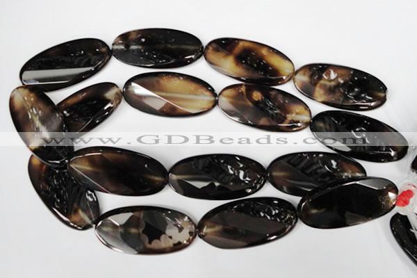 CAG3091 15.5 inches 25*50mm faceted oval black line agate beads