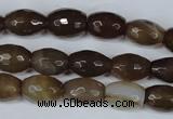 CAG3129 15.5 inches 10*14mm faceted rice brown line agate beads