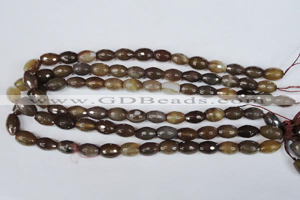 CAG3129 15.5 inches 10*14mm faceted rice brown line agate beads