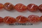 CAG4184 15.5 inches 6*10mm twisted rice natural fire agate beads