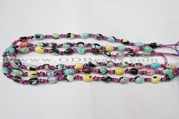 CAG5770 15 inches 6*9mm faceted rice fire crackle agate beads