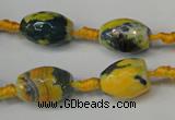 CAG5774 15 inches 10*14mm faceted rice fire crackle agate beads