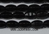 CAG6029 15.5 inches 6*10mm faceted rice matte black agate beads