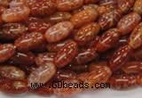 CAG604 15.5 inches 6*12mm rice natural fire agate beads wholesale