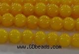 CAR401 15.5 inches 6mm round synthetic amber beads wholesale