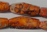 CDE745 15.5 inches 13*42mm faceted rice dyed sea sediment jasper beads