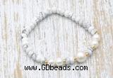 CFB702 faceted rondelle white howlite & potato white freshwater pearl stretchy bracelet