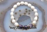 CFB910 9mm - 10mm rice white freshwater pearl & dogtooth amethyst stretchy bracelet