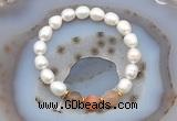 CFB913 9mm - 10mm rice white freshwater pearl & rainbow moonstone stretchy bracelet