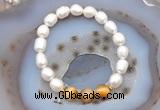 CFB914 9mm - 10mm rice white freshwater pearl & golden tiger eye stretchy bracelet