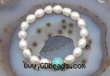 CFB926 9mm - 10mm rice white freshwater pearl & blue sea sediment jasper stretchy bracelet