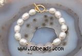 CFB934 Hand-knotted 9mm - 10mm rice white freshwater pearl & rose quartz bracelet