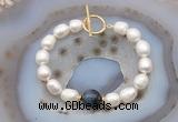 CFB979 Hand-knotted 9mm - 10mm rice white freshwater pearl & blue tiger eye bracelet