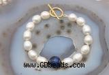 CFB980 Hand-knotted 9mm - 10mm rice white freshwater pearl & blue tiger eye bracelet