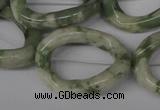 CFG270 15.5 inches 25*30mm carved oval peace stone beads