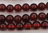 CGA601 15.5 inches 6mm A grade round natural orange garnet beads