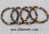 CGB6027 8mm round grade AA colorful tiger eye bracelet with skull for men