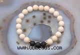 CGB6490 8mm round matte white fossil jasper & black lava beaded bracelets