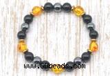 CGB8411 8mm synthetic amber, black onyx & hematite energy bracelet