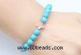 CGB9352 8mm, 10mm blue howlite & cross hematite power beads bracelets