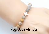 CGB9434 8mm, 10mm matte fossil coral & cross hematite power beads bracelets