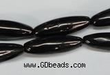 CJB54 15.5 inches 10*30mm rice natural jet gemstone beads