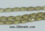 CLQ10 15.5 inches 6*10mm faceted rice natural lemon quartz beads