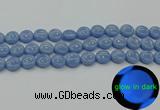 CLU132 15.5 inches 12mm flat round blue luminous stone beads