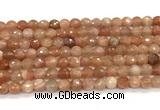 CMS2258 15 inches 6mm faceted round orange moonstone beads