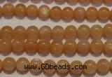 CMS701 15.5 inches 6mm round peach moonstone beads wholesale