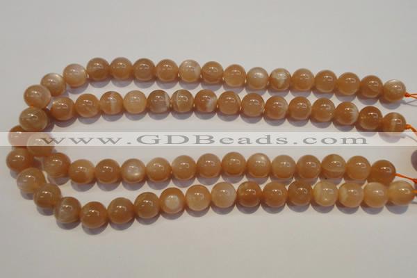 CMS704 15.5 inches 12mm round peach moonstone beads wholesale