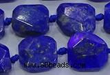 CNG5815 15.5 inches 10*12mm - 10*14mm faceted freeform lapis lazuli beads