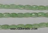 CRU165 15.5 inches 5*8mm faceted rice green rutilated quartz beads