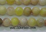 CSS600 15.5 inches 4mm round yellow sunstone gemstone beads