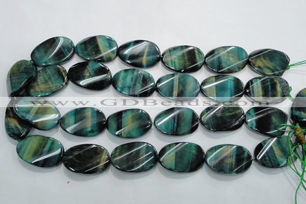 CTE1079 15.5 inches 22*30mm twisted oval dyed green tiger eye beads