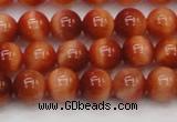 CTE1661 15.5 inches 6mm round sun orange tiger eye beads