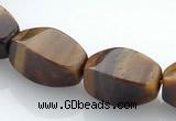 CTE26 8*15mm twisted oval yellow tiger eye beads Wholesale